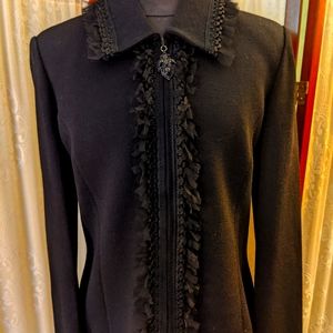 St John knit jacket. Fringe, organza trim,black metal zipper pull, size 10.